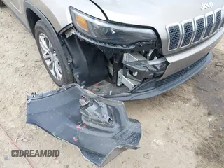 2021 Jeep Cherokee Altitude z VIN 1C4PJLLB8MD164590, wystawiony jako IAAI lot #41919423 z przebiegiem 29 672 mil mil oraz . Historia ofert i sprzedaży dostępna na DreamBid. Obrazek 6.