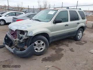 2003 Ford Escape XLT Popular 2 with VIN 1FMYU93183KB80977, listed as a IAAI auction lot 41657209 with 1 mi miles. Bid and sale history available at carsss.com. Image 2.