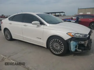 2013 Ford Fusion Titanium Hybrid с VIN 3FA6P0RU3DR282013, выставлен на аукционе Copart как лот 53651595 с пробегом 133 214 миль миль и Списание • Salvage title. История ставок и продаж доступна на DreamBid. Изображение 4.