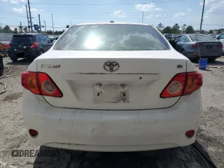 2009 Toyota Corolla with VIN JTDBL40E699047335, listed as a Copart auction lot 54758925 with 212,801 mi miles and Salvage Title. Bid and sale history available at carsss.com. Image 6.