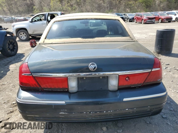 1999 Mercury Grand Marquis LS with VIN 2MEFM75W0XX731008, listed as a Copart auction lot 54375795 with 88,080 mi miles and Salvage Title. Bid and sale history available at DreamBid. Image 6.