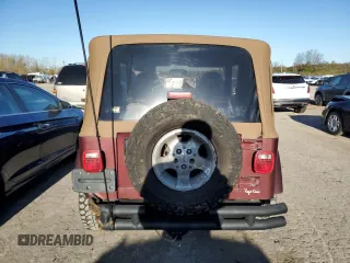 2001 Jeep Wrangler Sahara with VIN 1J4FA59S41P337699, listed as a Copart auction lot 80493224 with 143,036 mi miles and Salvage Title. Bid and sale history available at carsss.com. Image 6.