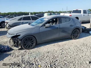 2019 Mazda Mazda3 Hatchback w/Premium Pkg with VIN JM1BPANM2K1143938, listed as a Copart auction lot 65640214 with 54,954 mi miles and Salvage Title. Bid and sale history available at carsss.com. Image 1.