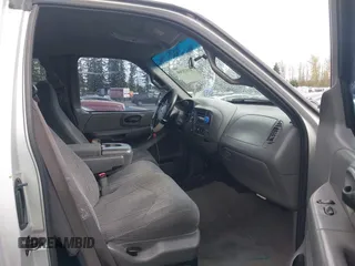 2000 Ford F-150 XL z VIN 1FTRX18L8YKA72409, wystawiony jako IAAI lot #41928360 z przebiegiem 167 251 mil mil oraz . Historia ofert i sprzedaży dostępna na DreamBid. Obrazek 5.