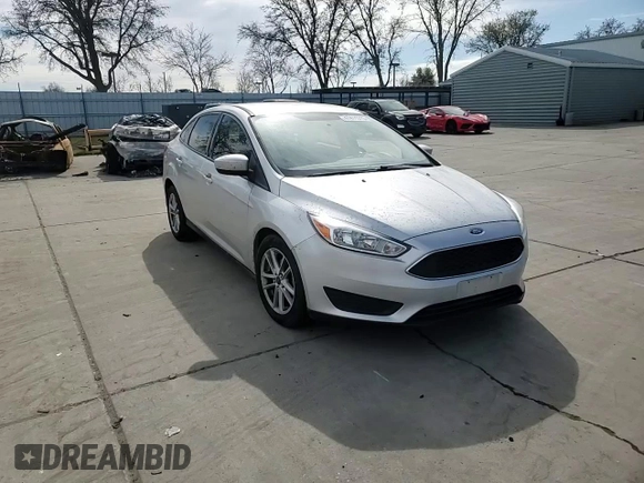 2018 Ford Focus SE with VIN 1FADP3FE3JL261145, listed as a Copart auction lot 47411315 with 98,581 mi miles and Salvage Title. Bid and sale history available at carsss.com. Image 10.