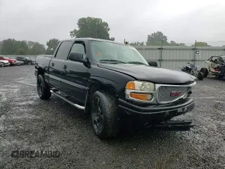 2006 GMC Sierra Denali z VIN 2GTEK63N061214588, wystawiony jako Copart lot #66483814 z przebiegiem Nie podano mil oraz Szkody całkowita. Historia ofert i sprzedaży dostępna na DreamBid. Obrazek 11.