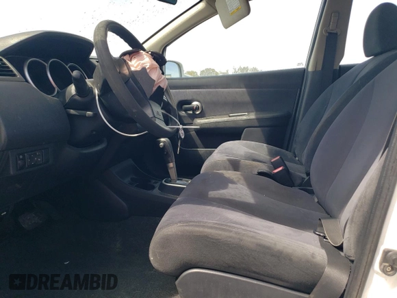 2009 Nissan Versa S with VIN 3N1BC11E89L363388, listed as a Copart auction lot 51301785 with 91,388 mi miles and Salvage Title. Bid and sale history available at DreamBid. Image 7.