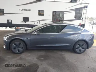 2020 Tesla Model 3 Standard Range Plus with VIN 5YJ3E1EA8LF743405, listed as a IAAI auction lot 41923592 with 81,901 mi miles. Bid and sale history available at carsss.com. Image 14.