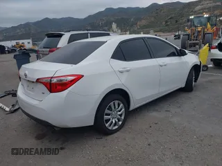 2015 Toyota Corolla L with VIN 5YFBURHE4FP273894, listed as a IAAI auction lot 42189654 with 140,613 mi miles and . Bid and sale history available at DreamBid. Image 4.