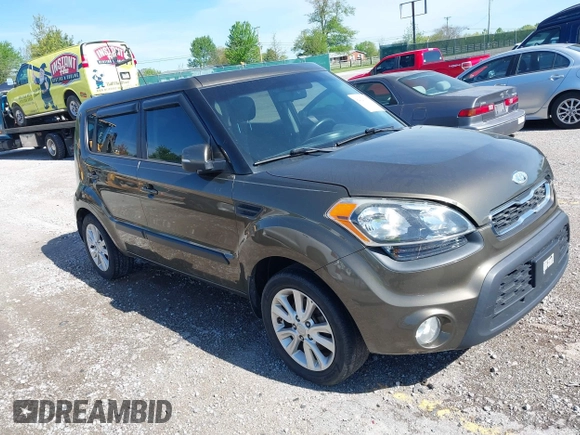 2012 Kia Soul + with VIN KNDJT2A60C7472303, listed as a IAAI auction lot 42126057 with 308,726 mi miles. Bid and sale history available at carsss.com. Image 1.