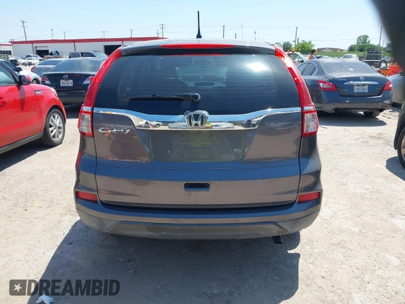 2015 Honda CR-V LX with VIN 2HKRM3H35FH509721, listed as a IAAI auction lot 42048149 with 262,759 mi miles and . Bid and sale history available at carsss.com. Image 16.