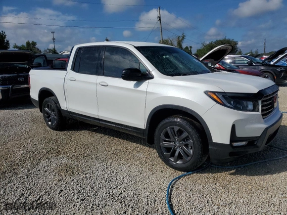 2022 Honda Ridgeline Sport with VIN 5FPYK3F10NB014575, listed as a Copart auction lot 74203854 with 12,176 mi miles and Non Repairable. Bid and sale history available at carsss.com. Image 4.