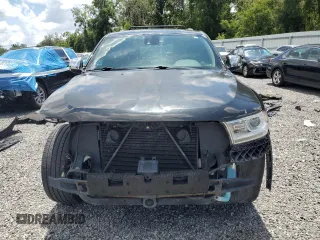 2014 Dodge Durango Citadel with VIN 1C4SDJET1EC349261, listed as a Copart auction lot 61129465 with 201,451 mi miles and Salvage title. Bid and sale history available at DreamBid. Image 5.