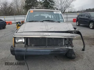 1987 Jeep Cherokee z VIN 1JCMR7819HT151523, wystawiony jako Copart lot #51586765 z przebiegiem 113 668 mil mil oraz Szkoda całkowita • Salvage title. Historia ofert i sprzedaży dostępna na DreamBid. Obrazek 5.