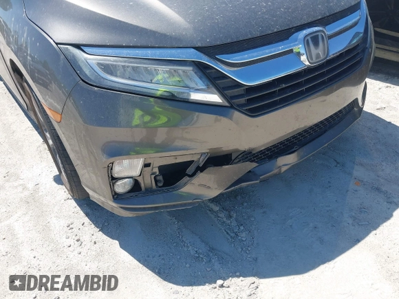 2020 Honda Odyssey Touring with VIN 5FNRL6H87LB002202, listed as a IAAI auction lot 42015741 with 182,051 mi miles and . Bid and sale history available at DreamBid. Image 6.
