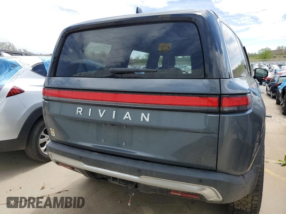 2023 Rivian R1S Adventure z VIN 7PDSGABA3PN018823, wystawiony jako Copart lot #53184595 z przebiegiem 36 677 mil mil oraz Szkoda całkowita • Salvage title. Historia ofert i sprzedaży dostępna na DreamBid. Obrazek 6.