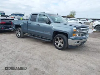 2014 Chevrolet Silverado 1500 LT with VIN 1GCRCREH4EZ296256, listed as a IAAI auction lot 41149836 with 116,955 mi miles and . Bid and sale history available at DreamBid. Image 1.