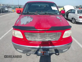 2003 Ford F-150 XLT with VIN 1FTRW08L43KD14456, listed as a IAAI auction lot 42098830 with 234,908 mi miles. Bid and sale history available at carsss.com. Image 13.