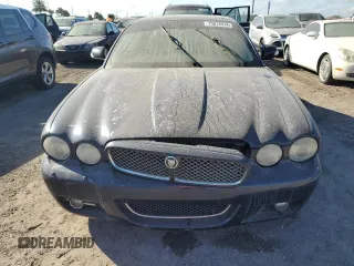 2008 Jaguar XJ with VIN SAJWA79B58SH25389, listed as a Copart auction lot 75014914 with 0 mi miles and Salvage Title. Bid and sale history available at carsss.com. Image 5.