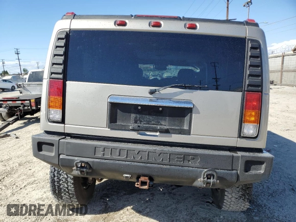 2003 Hummer H2 with VIN 5GRGN23U93H132656, listed as a Copart auction lot 71987404 with 152,287 mi miles and Salvage Title. Bid and sale history available at carsss.com. Image 6.