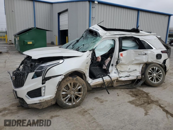 2021 Cadillac XT5 FWD Premium Luxury z VIN 1GYKNCR41MZ154357, wystawiony jako Copart lot #86819564 z przebiegiem Nie podano mil oraz Nie do naprawy • Non repairable. Historia ofert i sprzedaży dostępna na DreamBid. Obrazek 1.