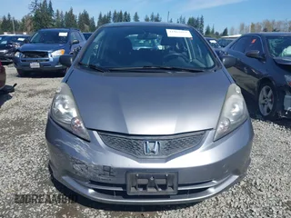 2010 Honda Fit with VIN JHMGE8H20AC010062, listed as a IAAI auction lot 41964011 with 104,651 mi miles. Bid and sale history available at carsss.com. Image 12.