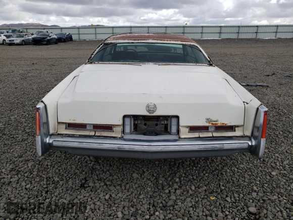 1975 Cadillac Eldorado z VIN 6L47S5Q245199, wystawiony jako Copart lot #51089325 z przebiegiem 2 991 mil mil oraz Czysty tytuł • Clean title. Historia ofert i sprzedaży dostępna na DreamBid. Obrazek 6.