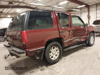 1999 GMC Yukon with VIN 1GKEK13R3XJ700930, listed as a IAAI auction lot 40915481 with 249,773 mi miles. Bid and sale history available at carsss.com. Image 4.