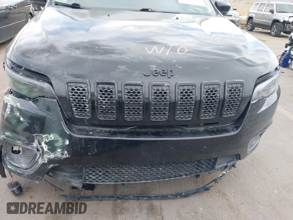 2020 Jeep Cherokee Altitude with VIN 1C4PJMLX9LD634920, listed as a IAAI auction lot 41892720 with 75,388 mi miles and . Bid and sale history available at DreamBid. Image 6.