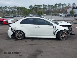 2011 Mitsubishi Lancer Evolution GSR with VIN JA32W8FV9BU045781, listed as a IAAI auction lot 41308314 with 102,840 mi miles. Bid and sale history available at carsss.com. Image 14.
