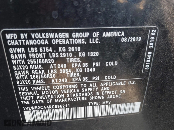 2019 Volkswagen Atlas SE with VIN 1V2WR2CA4KC595211, listed as a IAAI auction lot 41986643 with 96,299 mi miles and . Bid and sale history available at DreamBid. Image 9.