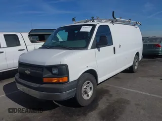 2014 Chevrolet Express Cargo Van with VIN 1GCWGFCB2E1122236, listed as a IAAI auction lot 41381131 with 70,696 mi miles. Bid and sale history available at carsss.com. Image 2.