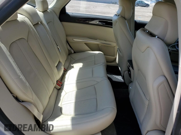 2015 Lincoln MKZ Hybrid z VIN 3LN6L2LU1FR617875, wystawiony jako Copart lot #55761545 z przebiegiem 75 321 mil mil oraz Szkoda całkowita • Salvage title. Historia ofert i sprzedaży dostępna na DreamBid. Obrazek 10.