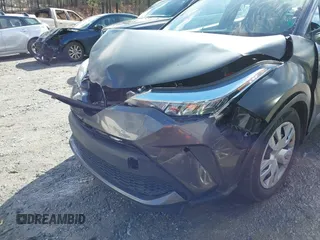 2021 Toyota C-HR LE with VIN NMTKHMBX9MR128998, listed as a IAAI auction lot 41575235 with 96,908 mi miles. Bid and sale history available at carsss.com. Image 6.