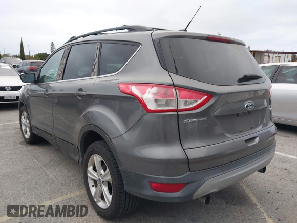 2013 Ford Escape SE with VIN 1FMCU0GX7DUA86521, listed as a IAAI auction lot 42041532 with 108,776 mi miles and . Bid and sale history available at DreamBid. Image 3.