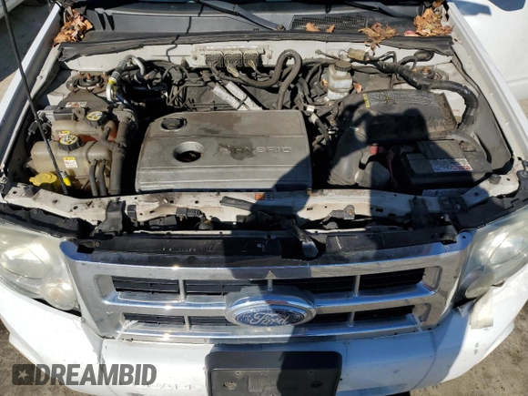 2010 Ford Escape Hybrid z VIN 1FMCU5K36AKD07129, wystawiony jako Copart lot #43914265 z przebiegiem 198 624 mil mil oraz Czysty tytuł • Clean title. Historia ofert i sprzedaży dostępna na DreamBid. Obrazek 11.