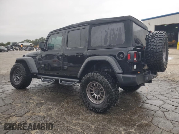 2023 Jeep Wrangler Sport with VIN 1C4HJXDN9PW638737, listed as a Copart auction lot 71367284 with 12,054 mi miles and Salvage Title. Bid and sale history available at DreamBid. Image 2.