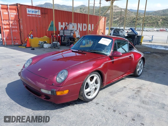 1997 Porsche 911 with VIN WP0AA2998VS322699, listed as a IAAI auction lot 41892833 with 117,174 mi miles and . Bid and sale history available at DreamBid. Image 2.