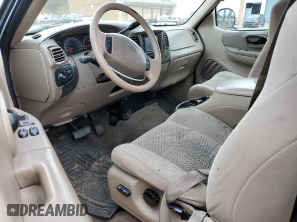 2003 Ford F-150 XL with VIN 1FTRX17L73KA47012, listed as a Copart auction lot 47410495 with 206,967 mi miles and Salvage title. Bid and sale history available at DreamBid. Image 8.