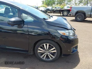 2015 Honda Fit EX-L with VIN 3HGGK5H89FM706018, listed as a IAAI auction lot 42417637 with 36,556 mi miles and . Bid and sale history available at DreamBid. Image 20.
