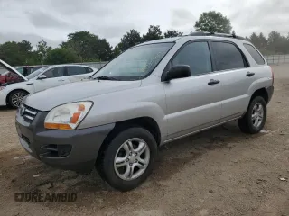 2006 Kia Sportage LX z VIN KNDJF723967198743, wystawiony jako Copart lot #57069305 z przebiegiem 131 088 mil mil oraz Szkoda całkowita • Salvage title. Historia ofert i sprzedaży dostępna na DreamBid. Obrazek 1.