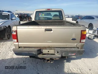 1999 Ford Ranger XLT with VIN 1FTYR14X1XPB75400, listed as a Copart auction lot 80879084 with 255,136 mi miles and Salvage Title. Bid and sale history available at DreamBid. Image 6.