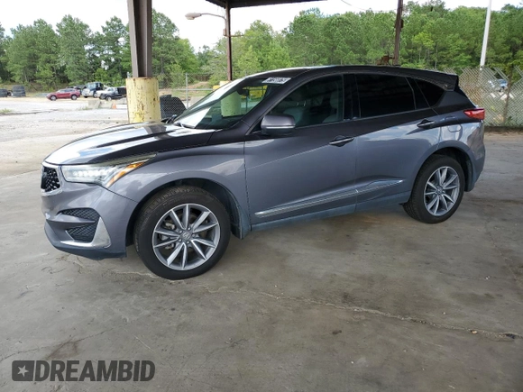 2020 Acura RDX Technology with VIN 5J8TC1H54LL004003, listed as a Copart auction lot 61156075 with 135,236 mi miles and Clean title. Bid and sale history available at DreamBid. Image 1.