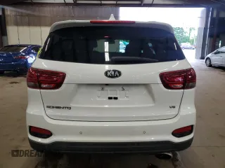 2019 Kia Sorento LX z VIN 5XYPGDA59KG456393, wystawiony jako Copart lot #61352805 z przebiegiem 102 479 mil mil oraz Czysty tytuł • Clean title. Historia ofert i sprzedaży dostępna na DreamBid. Obrazek 6.