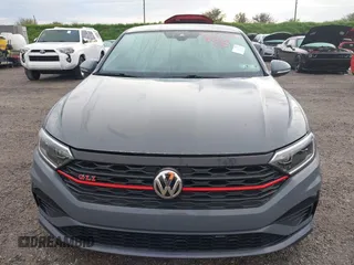2021 Volkswagen Jetta GLI S with VIN 3VW6T7BU8MM011418, listed as a IAAI auction lot 40474082 with 76,619 mi miles and . Bid and sale history available at DreamBid. Image 13.