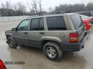 1996 Jeep Grand Cherokee Laredo with VIN 1J4GZ58S9TC172760, listed as a Copart auction lot 86086644 with 220,037 mi miles and Clean Title. Bid and sale history available at carsss.com. Image 2.
