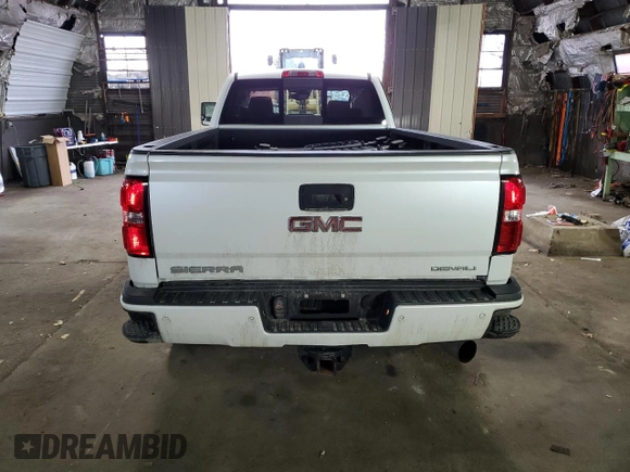 2019 GMC Sierra 3500HD Denali z VIN 1GT42WEY6KF250694, wystawiony jako Copart lot #50035115 z przebiegiem 59 735 mil mil oraz Szkody całkowita. Historia ofert i sprzedaży dostępna na DreamBid. Obrazek 6.