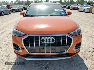 2021 Audi Q3 Premium with VIN WA1AUCF36M1060404, listed as a Copart auction lot 56501285 with 66,594 mi miles and Salvage title. Bid and sale history available at DreamBid. Image 5.