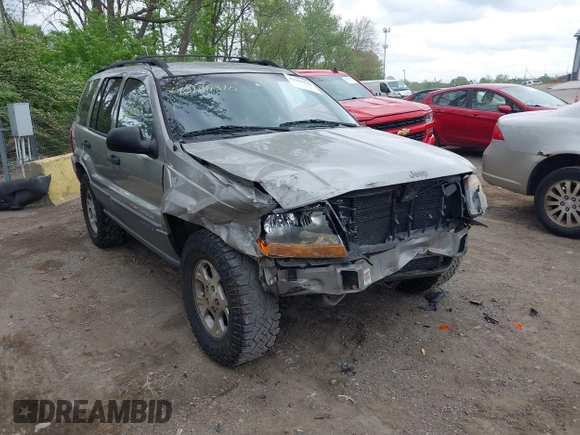 2001 Jeep Grand Cherokee Laredo z VIN 1J4GW48S01C658017, wystawiony jako IAAI lot #42160310 z przebiegiem 220 309 mil mil oraz . Historia ofert i sprzedaży dostępna na DreamBid. Obrazek 1.