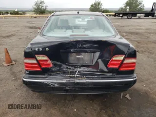 2000 Mercedes-Benz E-Class with VIN WDBJF65J5YB068297, listed as a Copart auction lot 69199004 with 236,751 mi miles and Salvage Title. Bid and sale history available at carsss.com. Image 6.
